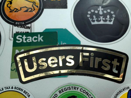 Sticker that reads 'Users first'