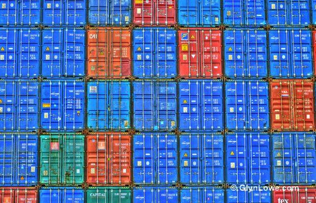 Photo of shipping containers stacked up